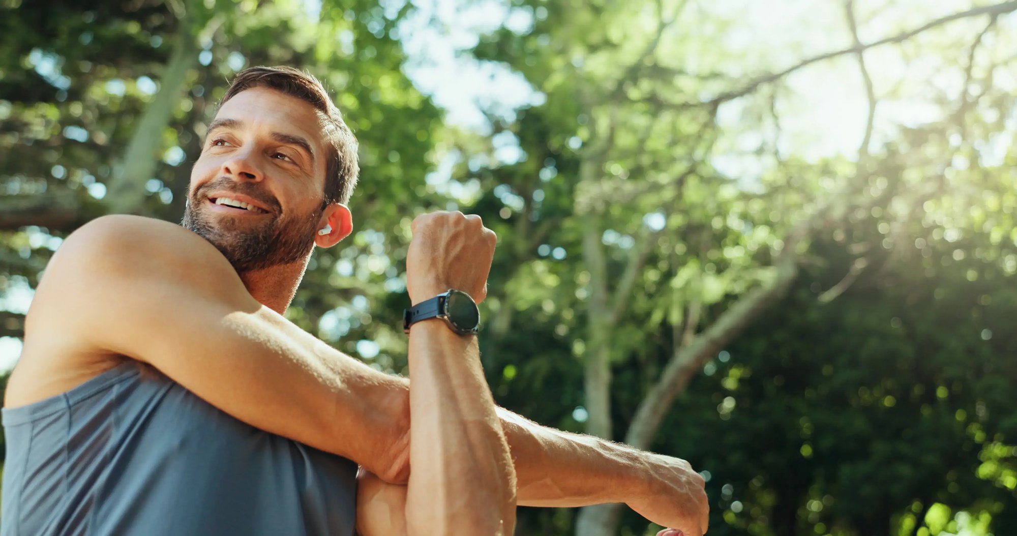 healthy-fit-man-stretching-happy
