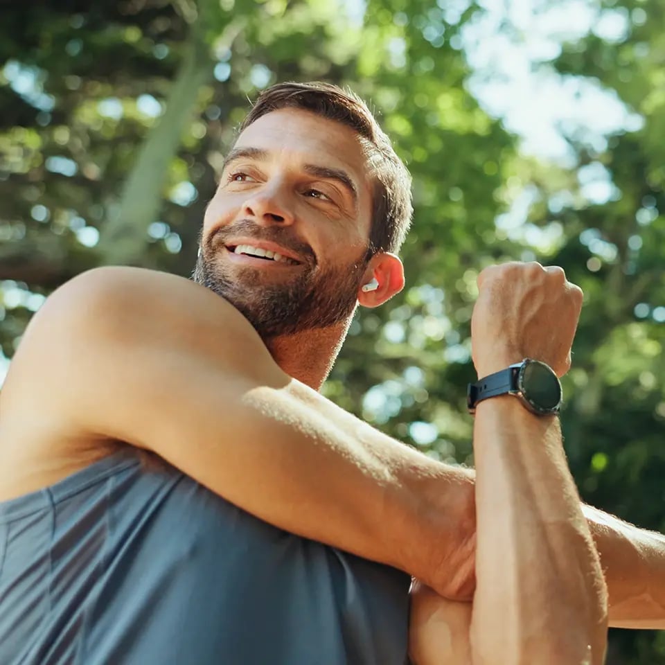 healthy-fit-man-stretching-happy_960px