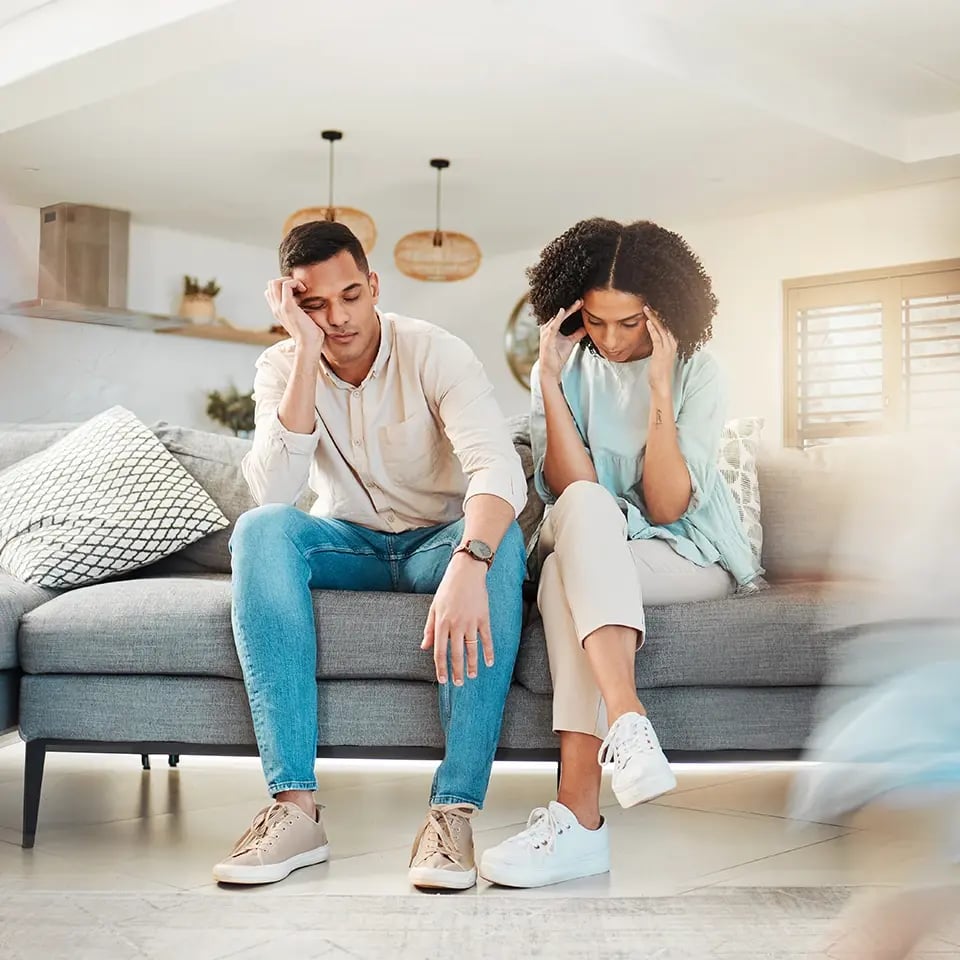 stressed-tired-couple-parents_960px